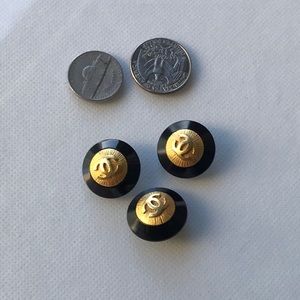3 identical size Chanel buttons
